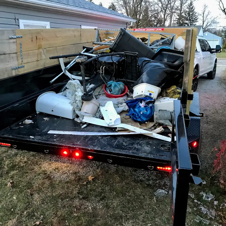 Roll-off dumpster delivered to a residential driveway in Prairie du Chien
