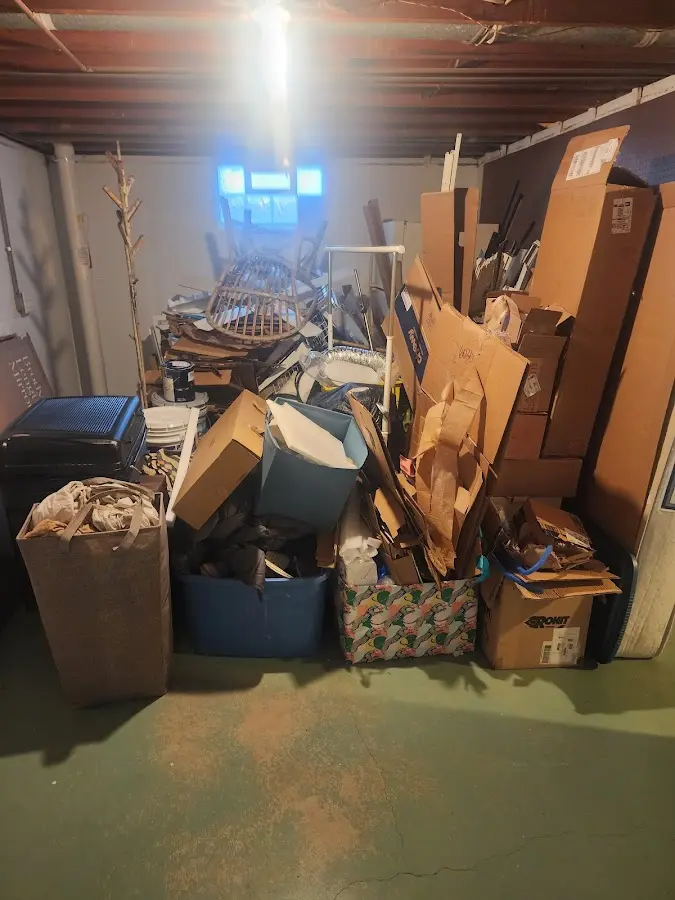 Roll-off dumpster container at job site for Construction Dumpster Rental in Prairie du Chien